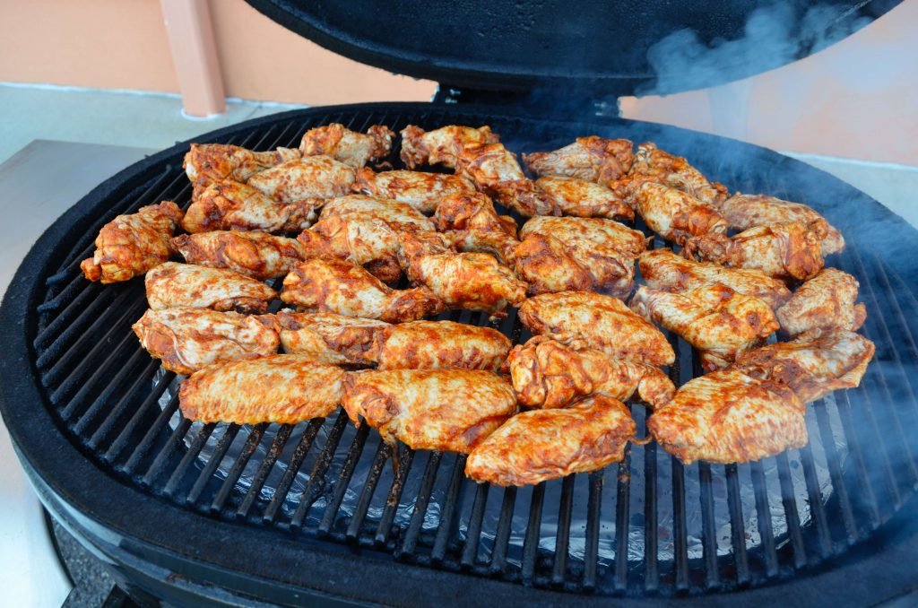 For chicken, we recommend a slightly hotter smoke around 275. To render out most of the fat, we recommend smoking them to an internal temp of 175. A Thermopen is the perfect tool to quickly check temps on a number of wings.