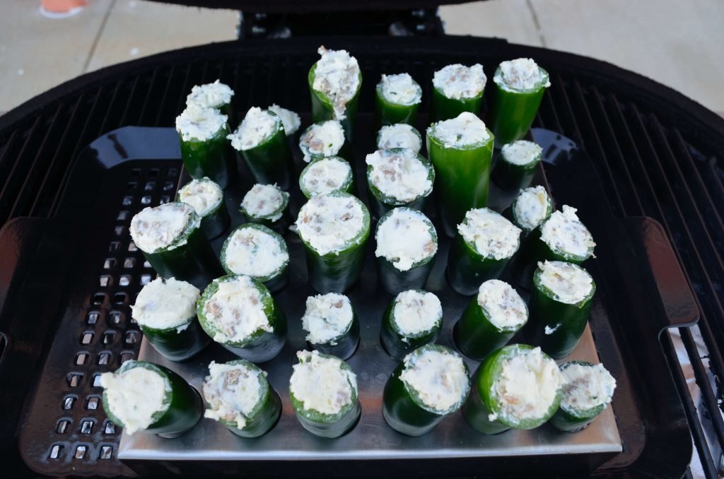 When sufficiently dry, stuff the jalapenos with the filling and place on the grill.