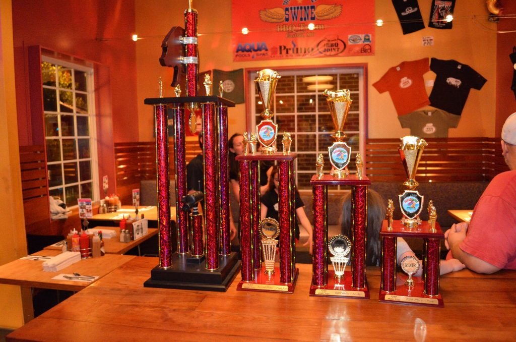 The winning hardware was on display at Chef Andrew's BBQ Joint in Easton later that night.  From the left was the Reserve Grand Champion Trophy, 2nd place Pork Ribs, 3rd place Brisket, and 5th place Pork.