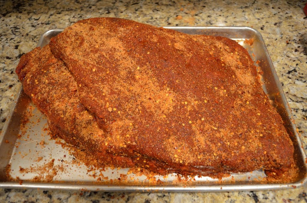 Rub the brisket well with your favorite rub- we used the BBQ Joint's Brisket Rub.  This rub can be as simple as kosher salt and cracked pepper.