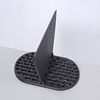 A cast iron divider and charcoal grate