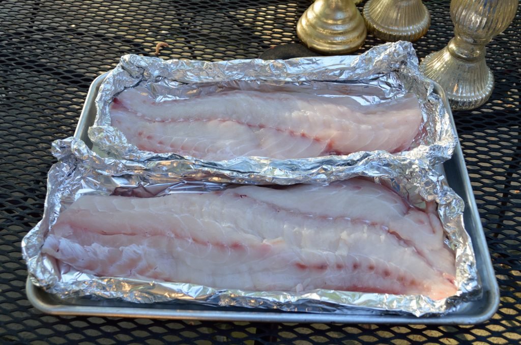 Start by brining the fillets in 1/2 cup of salt per gallon of water for 3 to 8 hours.