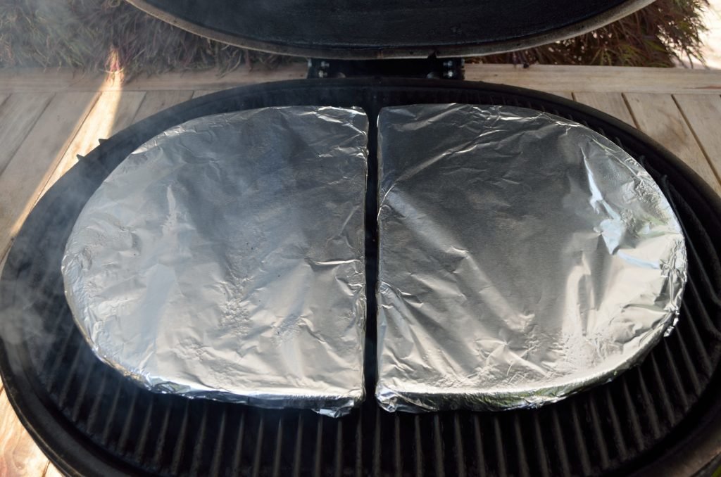At this point prepare the Primo.  We've used the Primo Pizza stones in the past and they work well for round breads and bigger, single loaves.  Here we opted to use the ceramic d plates wrapped in foil as the cooking stones since we were looking for longer loaves of bread.