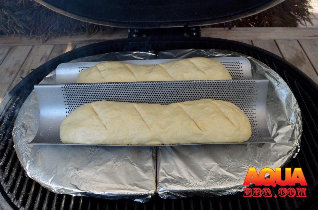 Once you've formed the loaves, let them rise for 5 minutes or so and then give them a few slashes.    We used a Chicago Metallic Commercial II Non-Stick Perforated French Bread Pan
