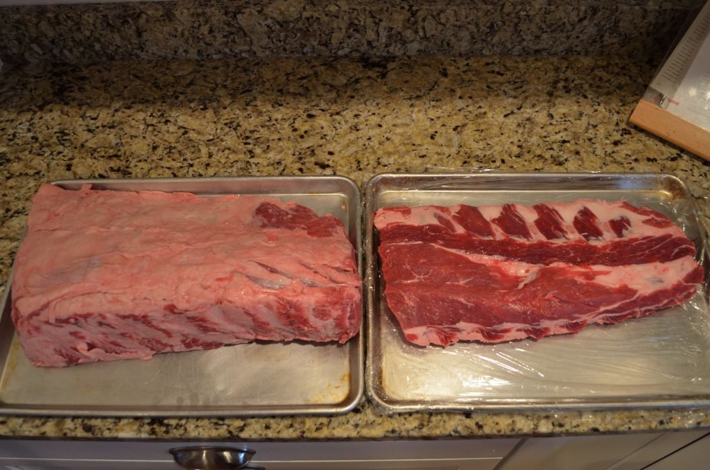 Start with any size or grade of Prime Rib Roast. We recommend trimming off as most of the fat to encourage the crust forming on meat, not fat. Separate the ribs from the roast. Salt generously and let it rest overnight in the fridge.