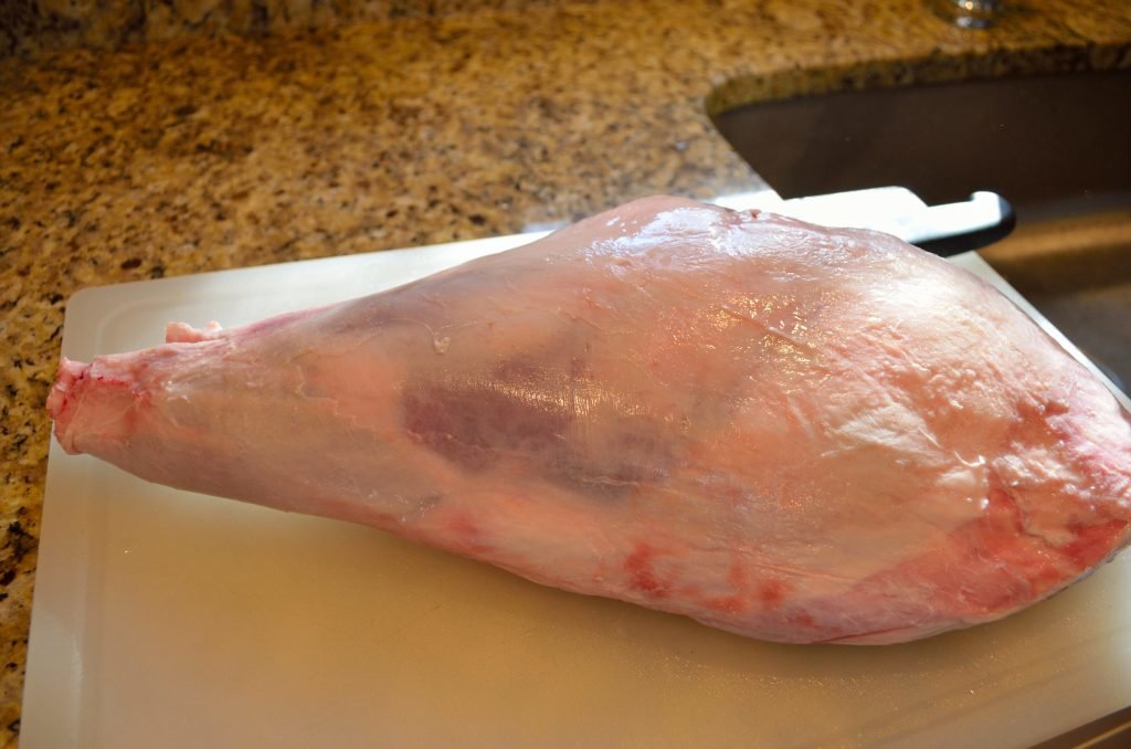 Here is the untrimmed leg of lamb, weighing a little over 6 lbs.