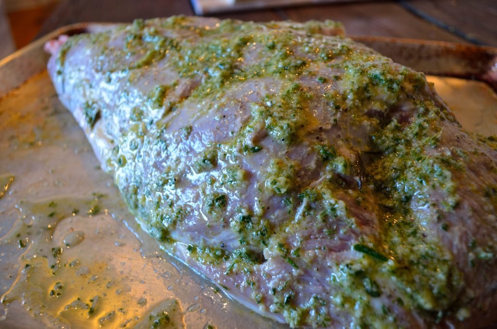 When ready, remove the leg of lamb from the brine and rub well with the herb paste.  Let it rest at room temperature for 1/2 hour or so before grilling.