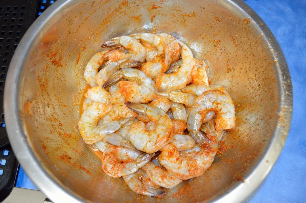 For this, we used 2lbs of jumbo shrimp (16/20 count) deveined with the tail on.  We coated them with 2 tablespoons of olive oil and 3 tablespoons of rub.
