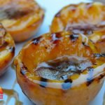 Grilled Peaches with a syrup on them